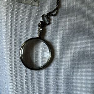 Magnifying glass pendant on chain